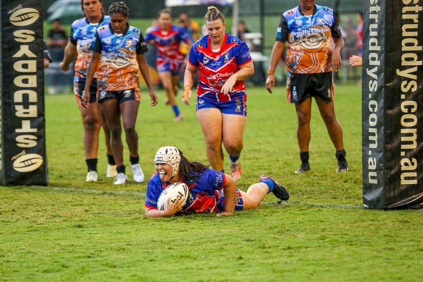 Newcastle Yowies celebrate their first try of the game. Photo: Jacob Grams/QRL