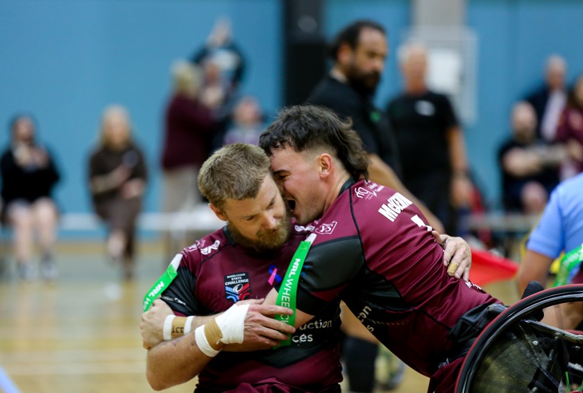 Schumacher and Bayley McKenna celebrate a try. Photo: Rikki-Lee Arnold/QRL