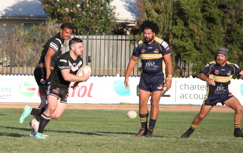 Easts Magpies coach Brent Kuskey makes a signature run in his playing comeback match against Waves Tigers on Sunday. Photo: Vince Habermann