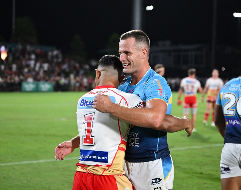 Foxwell after the Titans v Dolphins NRL pre-season trial, with Redcliffe Dolphins fullback Trai Fuller. Photo: NRL Imagery