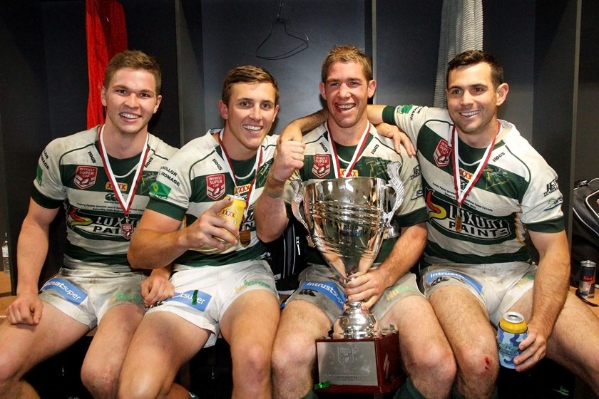 Parcell (left) with Ipswich teammates after winning the 2015 title.