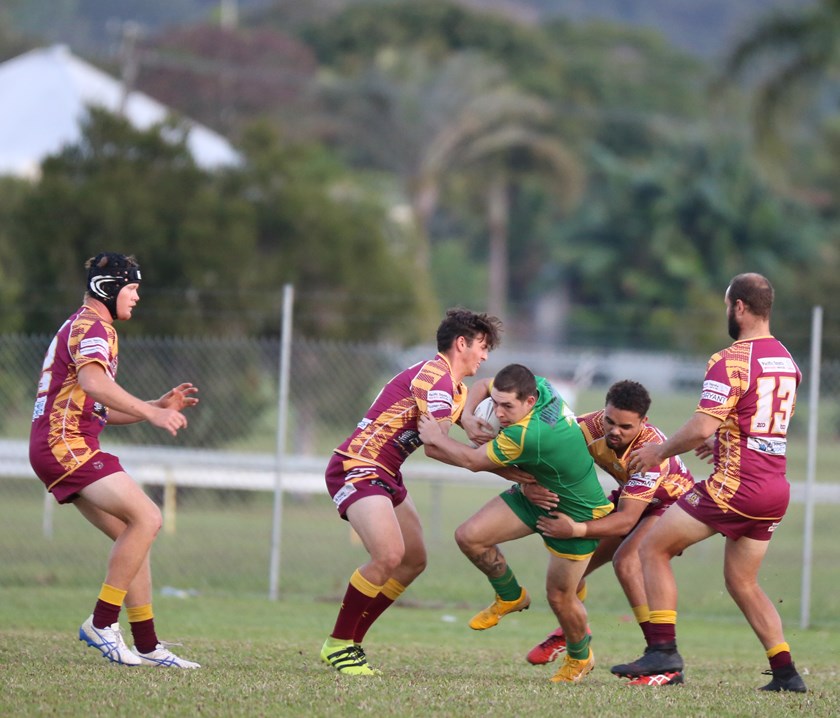Mareeba's first try scorer Josh Ward is sandwiched between two Southern Suburbs players. Photo: Maria Girgenti