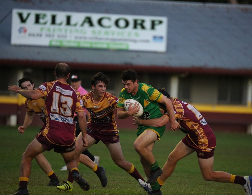 Mareeba player Caleb Dally makes a strong run up against the Southern Suburbs defence. Photo: Maria Girgenti