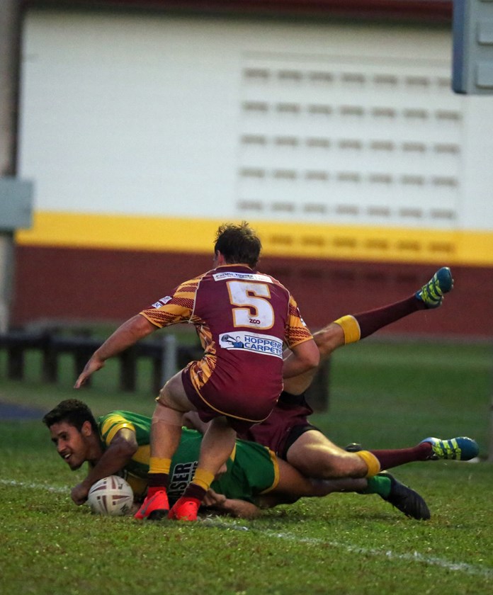 Mitch Brim beats the Southern Suburbs defence and crashes over for Mareeba's second try. Photo: Maria Girgenti