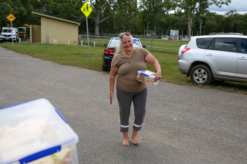 Fay Rapmund brings sandwiches to help at Stanley River. Photo: Jorja Brinums