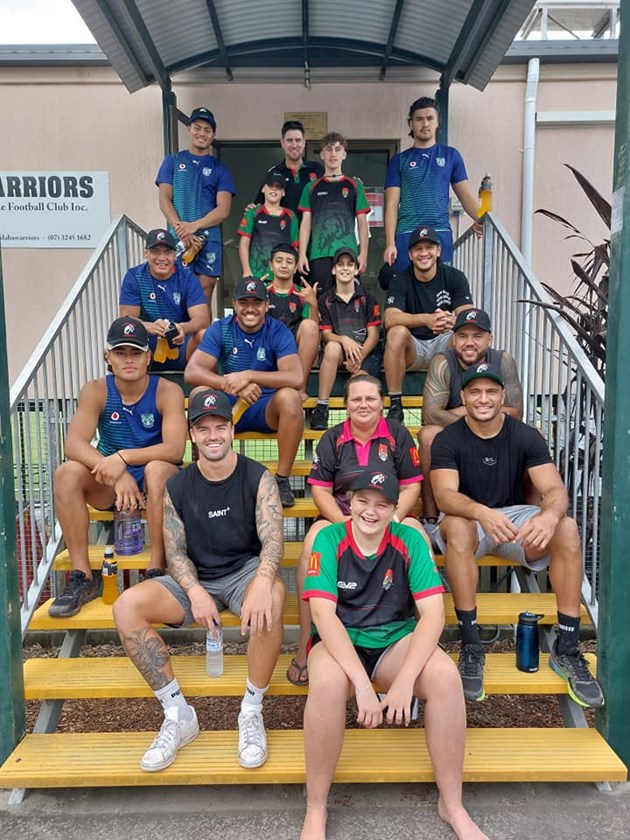 The NRL Warriors in their Capalaba Warriors hats, with some junior Capalaba Warriors, Tanya Bonney and Melony Bonney. Photo: Capalaba Warriors Facebook