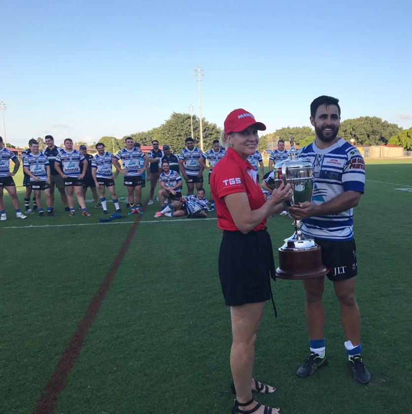 Brothers captain Nathan Norford was presented with the premiership trophy by Elizabeth Hodder representing Mendi group who is the A grade sponsor.