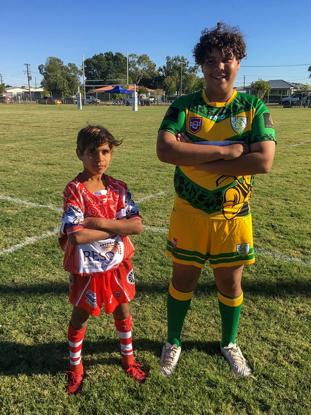 Under 14 Southern Outback player Quarn Collis in comparison with some of the other players at the carnival.