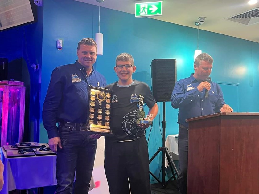 Elijah Talbot receiving his clubman of the year award last year.