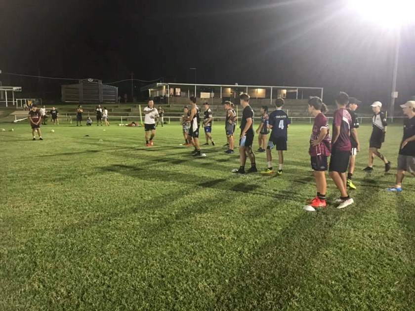 Todd Carney at training with some young Souths Sunnybank players.