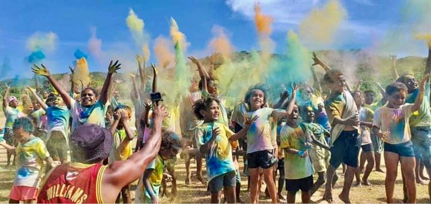 Kids on Yam Island taking part in the colour run. Photo: Magun Warriors Facebook/QRL