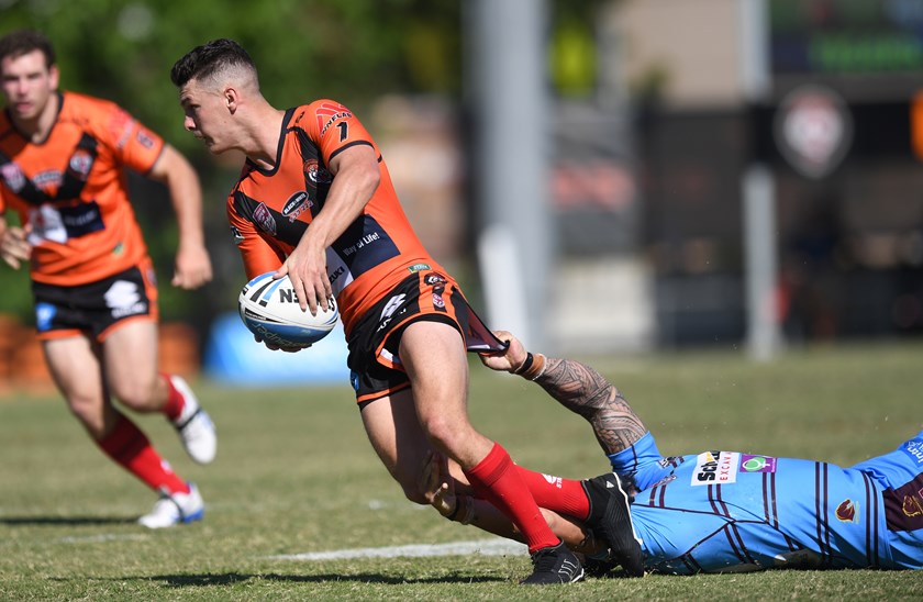 Josh Ralph running the ball against the Capras - Easts Tigers (Round 5)