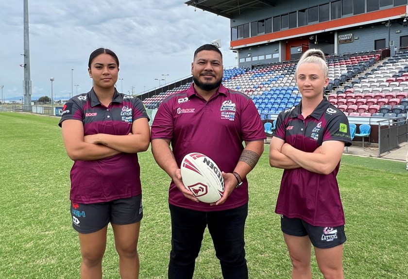 Players Jasmine Peters and Emma Manzelmann with coach, Marco Peters. Photo: Mackay Cutters/QRL