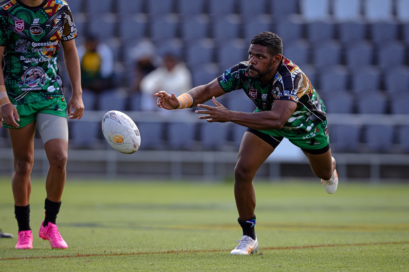 Kierran Moseley gets a pass away during his player of the match performance. Photo: Erick Lucero/QRL