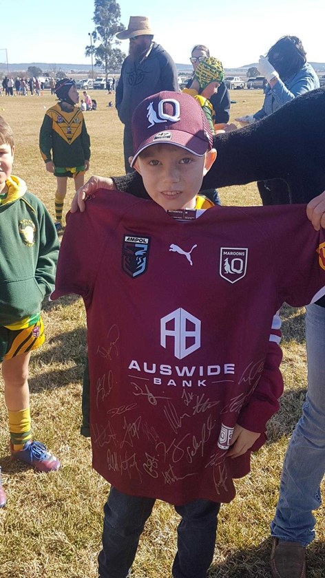 Joseph Ramsey with his signed Queensland Maroons jersey.