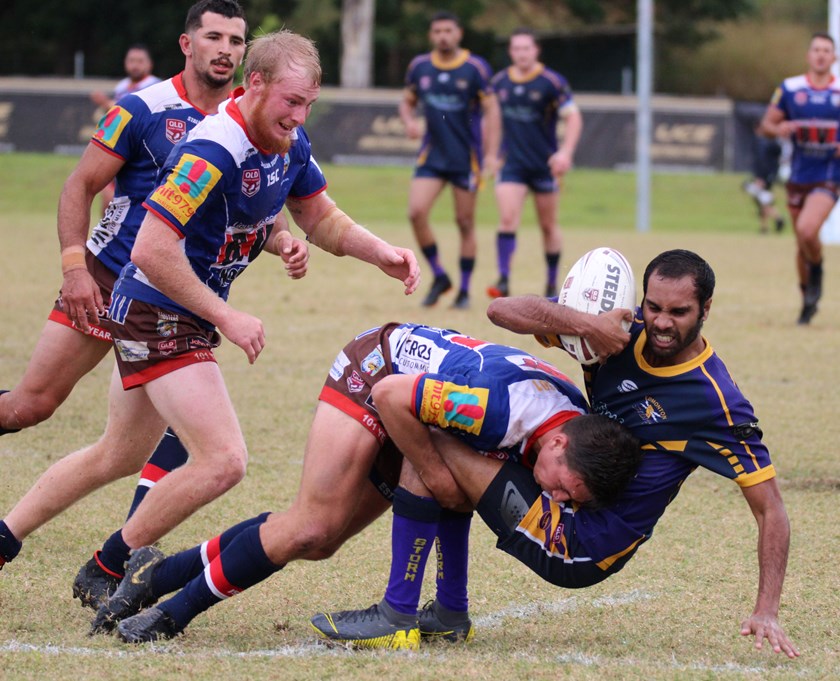 An Edmonton Storm player feels the brunt of Ned Blackman's tackle Photo: Maria Girgenti
