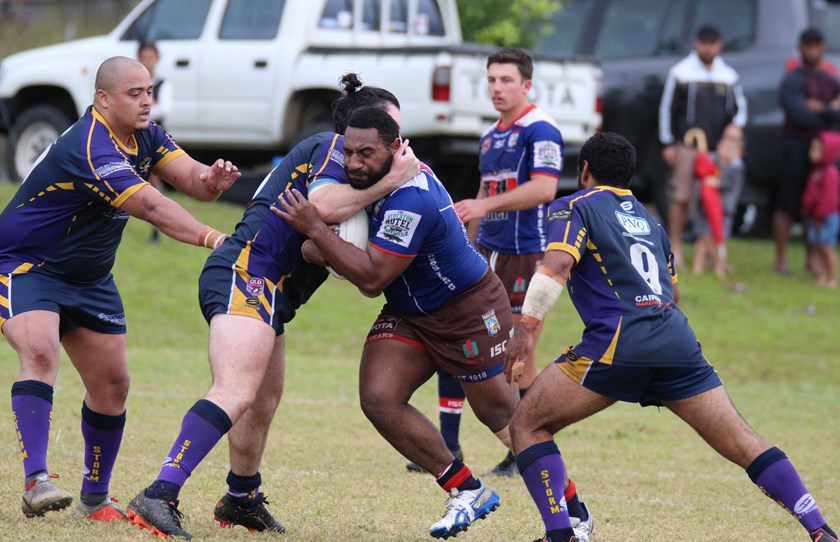 Atherton Roosters try scorer Mae Mani is halted by an Edmonton Storm player Photo: Maria Girgenti
