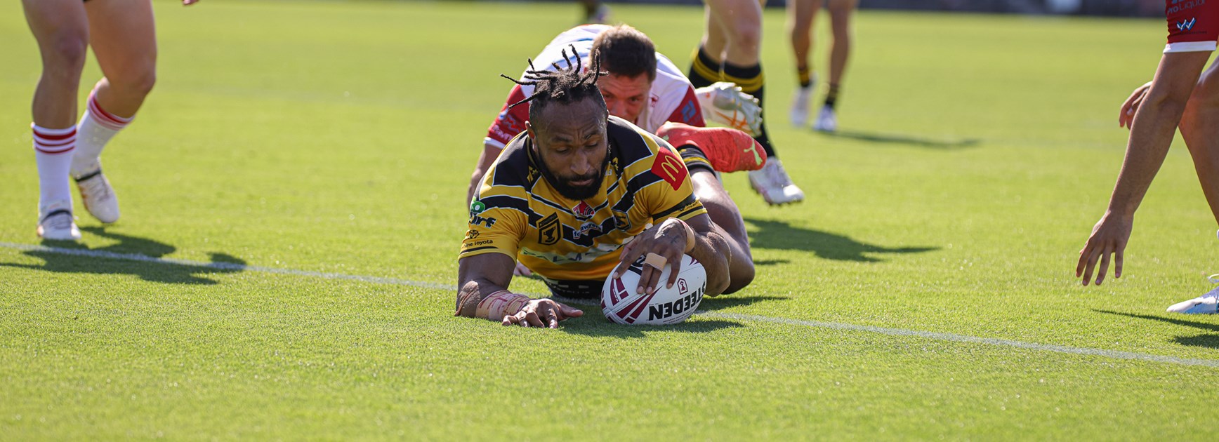 Justin Olam scores for the Sunshine Coast Falcons. Photo: Erick Lucero/QRL