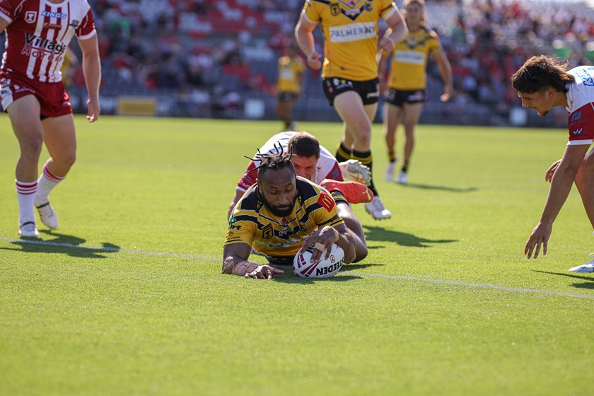 Justin Olam scores for the Sunshine Coast Falcons. Photo: Erick Lucero/QRL