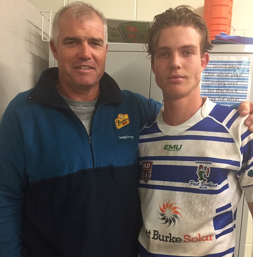 Jake Bonus with his father Anthony after making his A Grade debut in Brothers’ win.