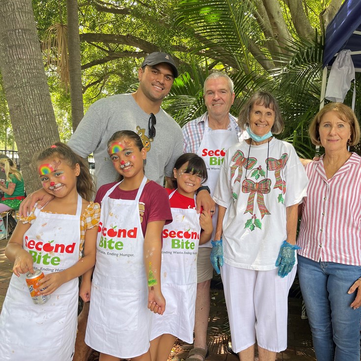 Magpies help pack a festive punch for families in need