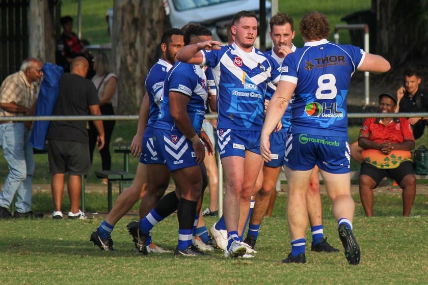 Izaac Skyring congratulates a teammate against West Brisbane Panthers earlier this year
