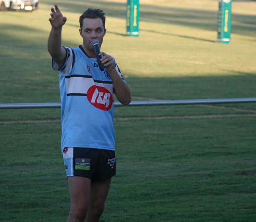 Henry Sinnamon holding the auction at the charity trials.