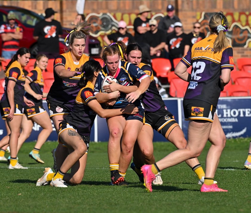 TRL Women player of the grand final Highfields' Eliza Morcom takes it up for her team