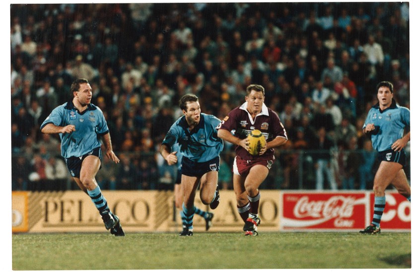 In action in maroon. 