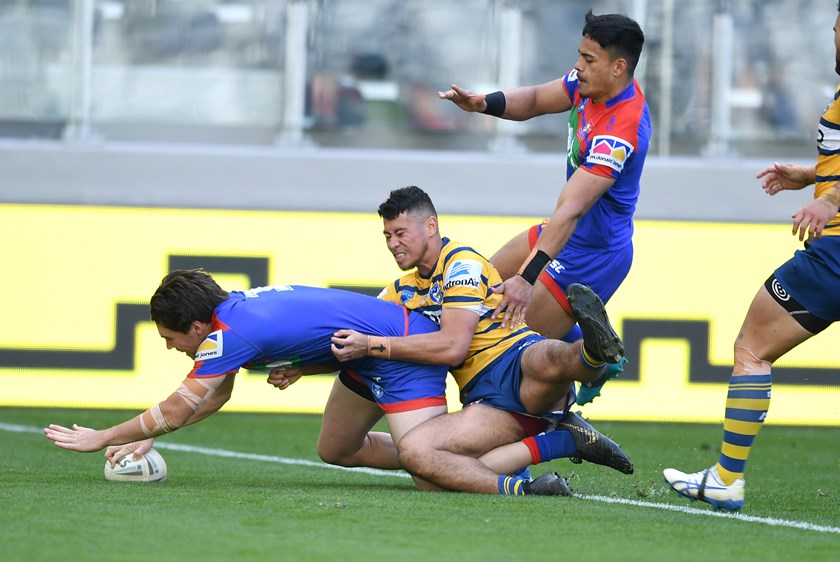 Scoring a try in Newcastle colours. Photo: NRL Images