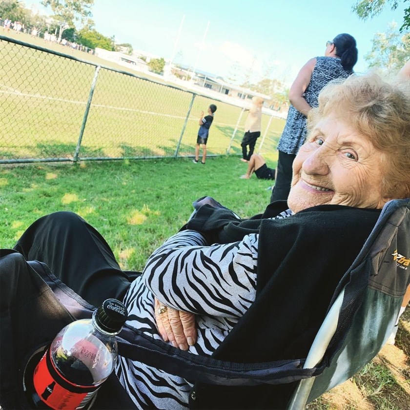 Betty on the sidelines cheering on her great grandson Jack.