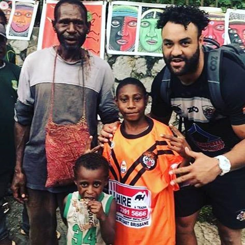 Tristan Lumley with some rugby league fans in PNG. Image: Supplied