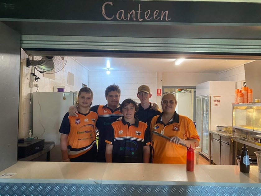 Trae Commins, Gav Wilson-Tyers, Kieran Johnston and Jackson Byrne helping Pani Wilson in the canteen. Photo: Wallaby Rugby League Club Gladstone Facebook