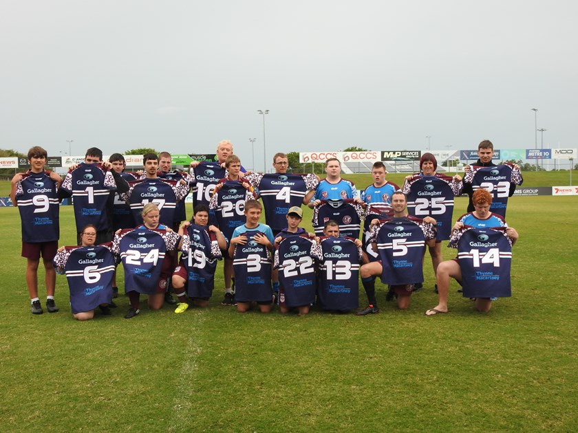 The Mackay team after being presented with their jerseys for the big game.