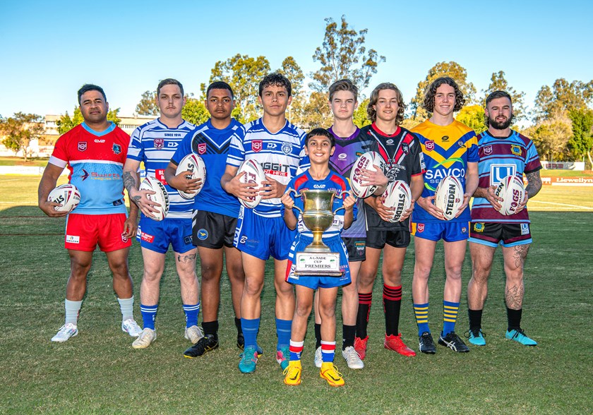 Redbank's Jakobi Noon (with the major trophy), flanked by Conrad Browne (Brothers), Ricco Moga (Goodna), Mason Thompson (Laidley/Rosewood), Dominic McClelland (Springfield), Isi Hafoka (Swifts), Taj Hinton (Brothers) and Aiden Boyce (West End). Photo: Lyle Radford/Ipswich Tribune