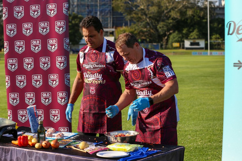 Steve Renouf and Kevin Walters cooking. Photo: Jorja Brinums/QRL