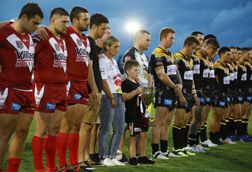 The Ackerman family, with both teams, before the game. Photo: QRL Media