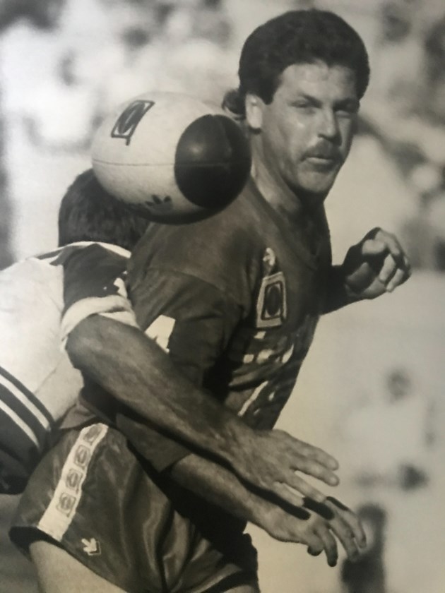 Miles unfurls a pass while playing for Wynnum Manly in the 1980s. Photo: NRL Images