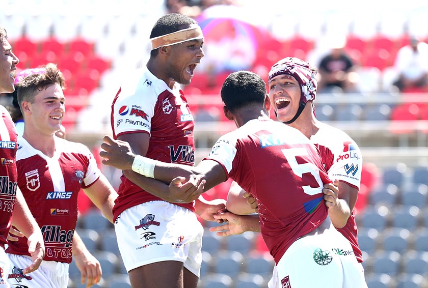 Michael Waqa and teammates in Round 1. Photo: Jason O'Brien/QRL