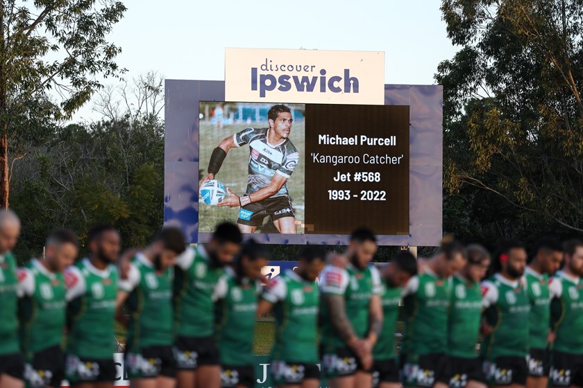 Ipswich Jets take a moment to remember Michael Purcell ahead of their Round 18 Hostplus Cup match. Photo: Erick Lucero/QRL