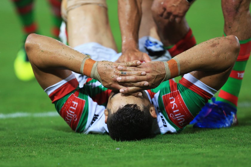 Greg Inglis after injuring his knee against Wests Tigers.