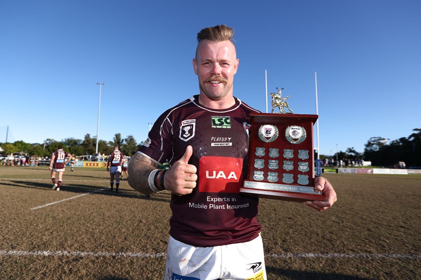 Bears captain Luke Page with the Ray McCarron Trophy. Photo: Jason O'Brien/QRL