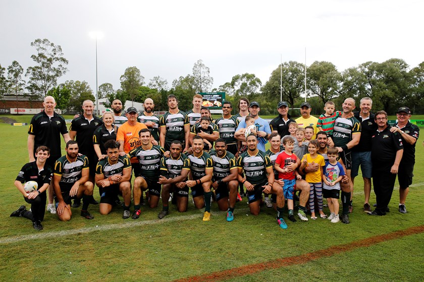 The Jets celebrate Ben and Shane Walker's 200th Intrust Super Cup game. Photo: QRL Media