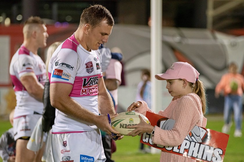 Nathan Watts with a young fan. Photo: Dolphins Media