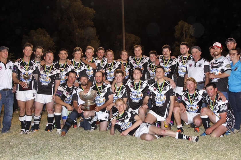 The Blackall Magpies celebrate their 2018 grand final win.