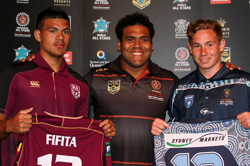 David Fifita is presented his Queensland Murri Under 16 jersey by Sam Thaiday. Photo: QRL