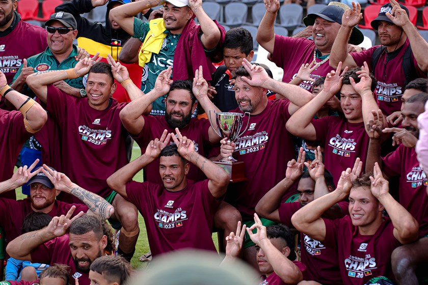 The Michael Purcell Memorial Team giving the trademark Michael Purcell 'kangaroo catcher' celebration after winning the 2023 Queensland Murri Carnival. Photo: Erick Lucero/QRL