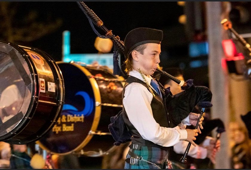 Tayt Rowe in the Anzac Day march in Mackay, with the Mackay Pipe Band. Photo: Brothers Bulldogs JRL Mackay Facebook