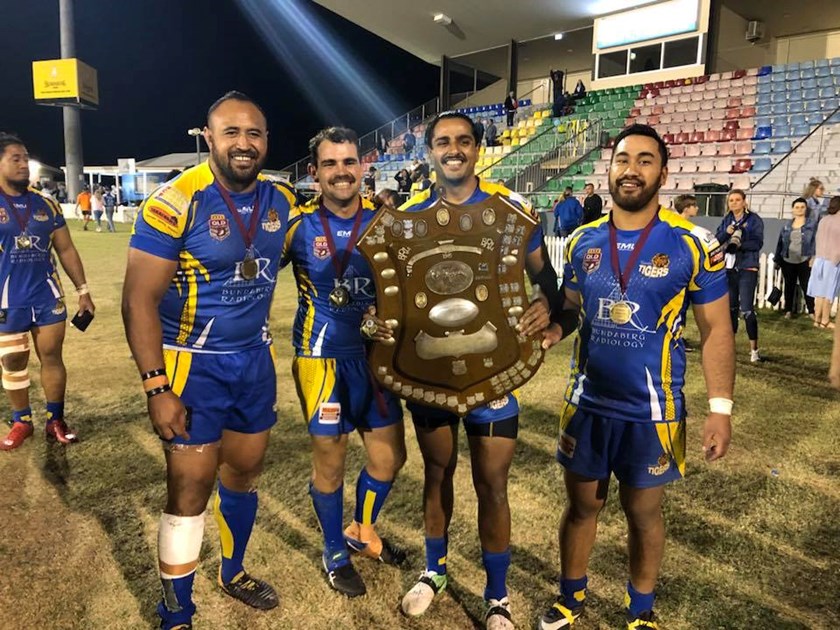 Nick Samra with last year's winning Bundaberg premiership team Across the Waves (Antonio Kaufusi on the left).