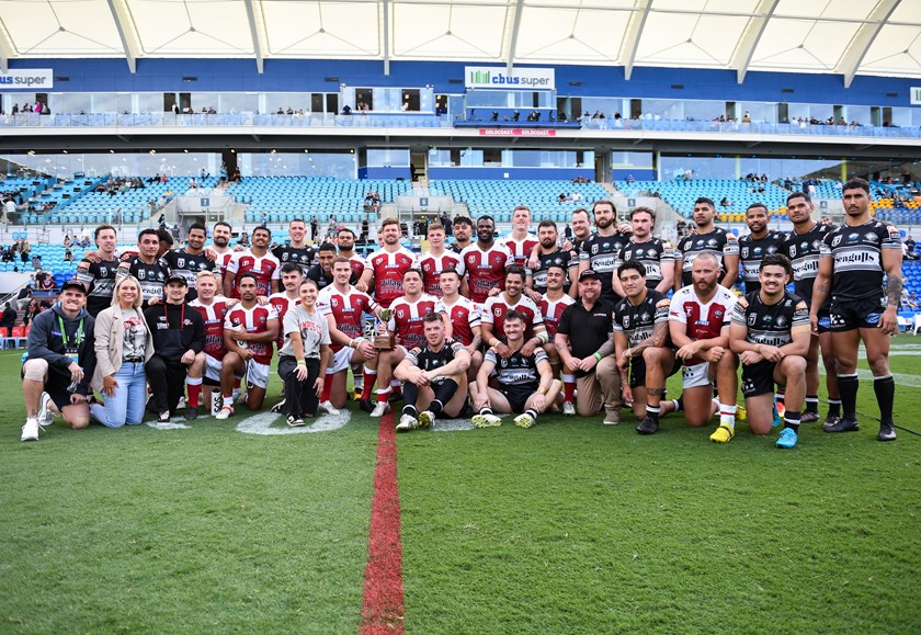 The Redcliffe Dolphins and Tweed Seagulls with the Hampson family after the inaugural Liam Hampson Cup. Photo: Zain Mohammed/QRL